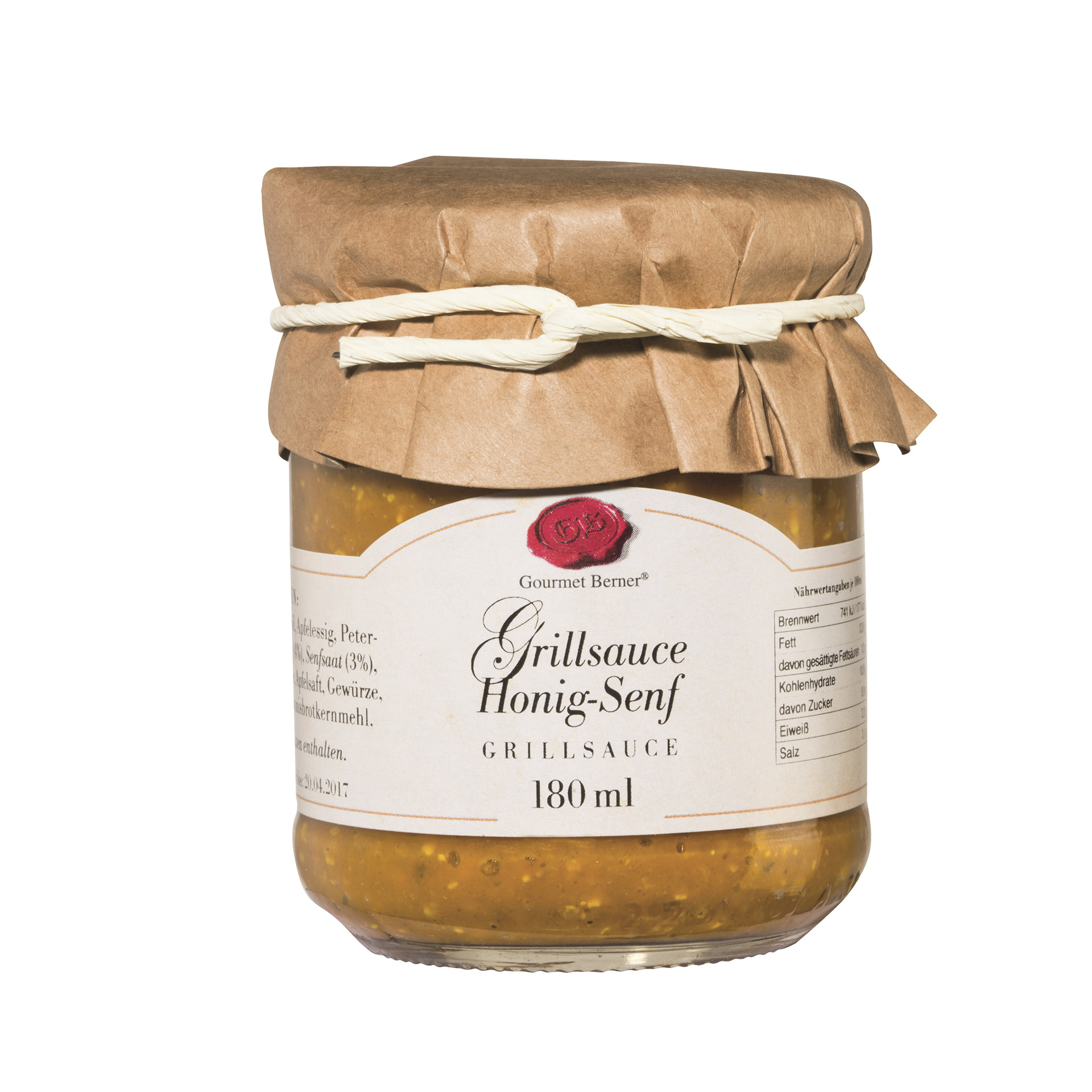 Sauce im Glas mit dekorativer Papierhaube über Deckel
